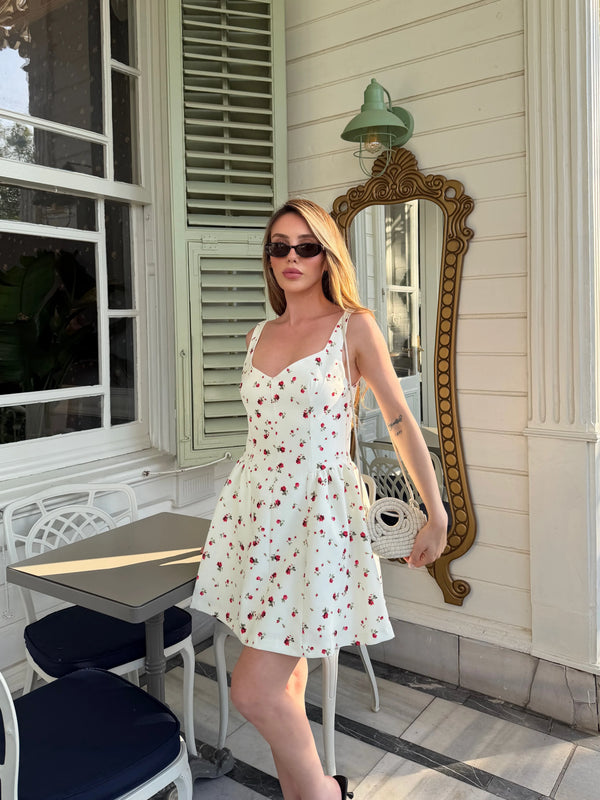 Ekru çiçek desenli V yakalı polyester mini elbise sol yan profil tam boy görünüm